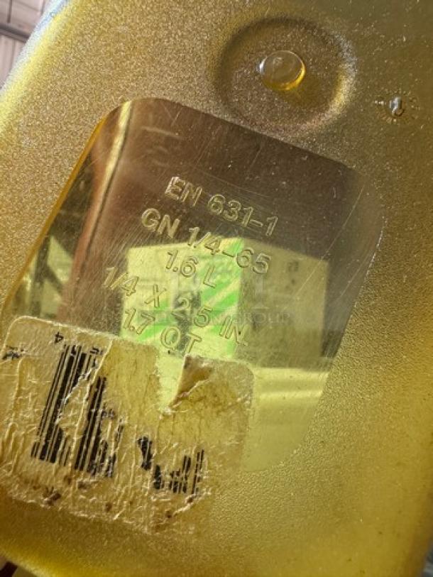 1/4x2.5IN Food pan BIDX4, capacity 1.6L, EN 631-1, GN 1/4-65, tan color, visible label with measurements.