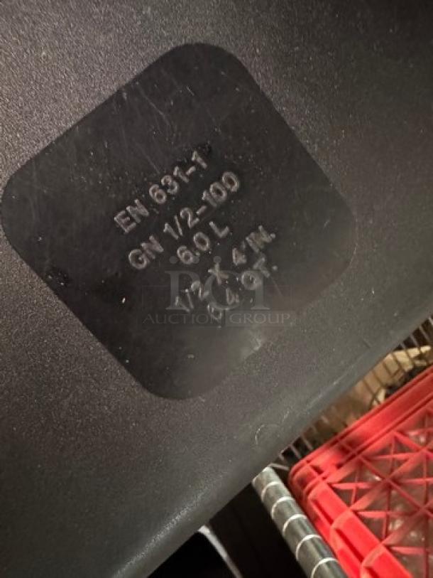 Black 1/2x4IN food pan with label showing EN 631-1, GN 1/2-100, 6.0L capacity; in good condition.