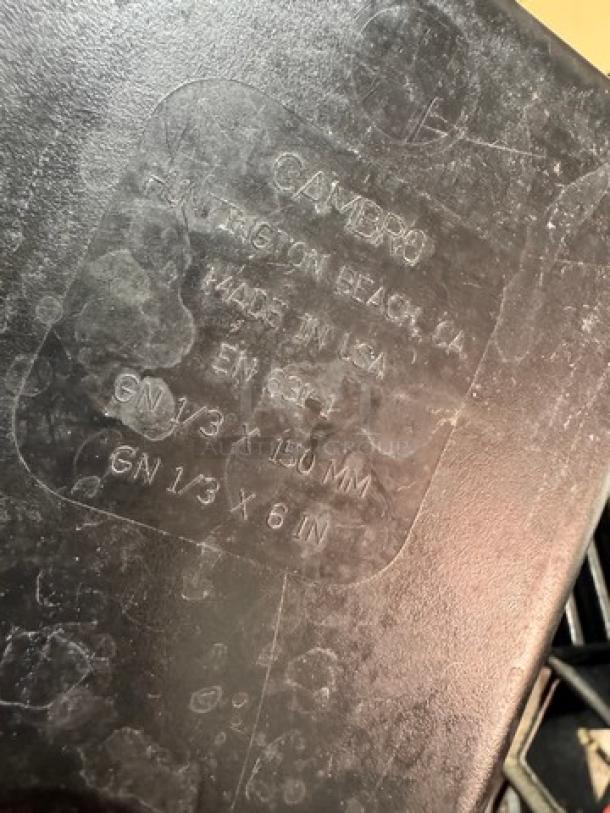 Cambro 1/3 x 6 in food pan, black, marked GN 1/3 150 mm, GN 1/3 x 6 in, good condition, minor surface wear.