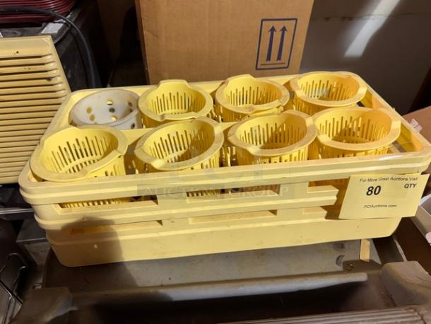Yellow warewashing rack with 9 round compartments, used condition. Tag reads "For More Great Auctions Visit PCIauctions.com, 80 QTY."