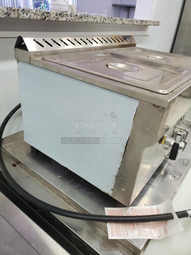 Gas Bain Marie QRTC-2T Liquid propane, stainless steel, dual compartment, slight exterior wear, gas hose attached.