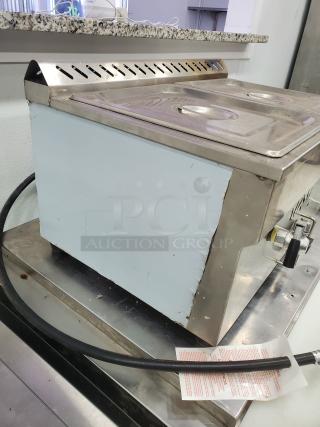 Gas Bain Marie QRTC-2T Liquid propane, stainless steel, dual compartment, slight exterior wear, gas hose attached.