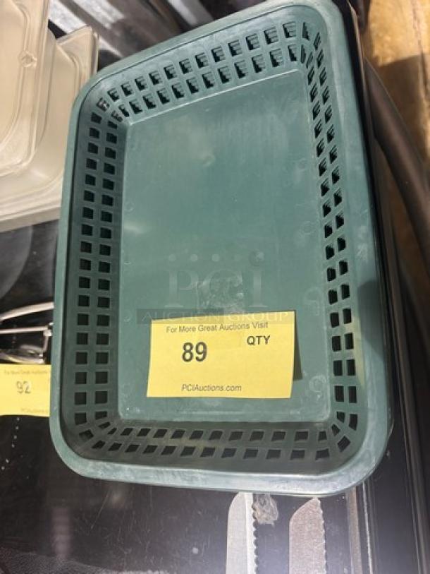 Lot of 14 green rectangular food baskets, used condition. Label reads "For More Great Auctions Visit," with quantity "89".