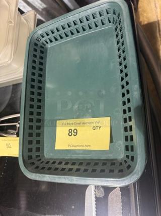 Lot of 14 green rectangular food baskets, used condition. Label reads "For More Great Auctions Visit," with quantity "89".