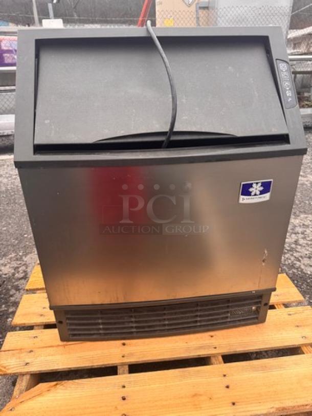 Manitowoc UYF014A-161B Icemaker, 115V, stainless steel finish, used condition, visible brand logo, pallet-mounted.