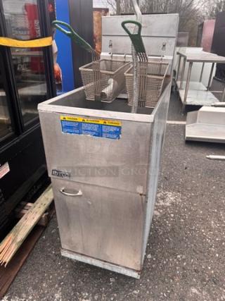 Pitco 35C+S natural gas floor fryer, 35 lbs capacity, includes 2 baskets, stainless steel finish, caution labels visible.