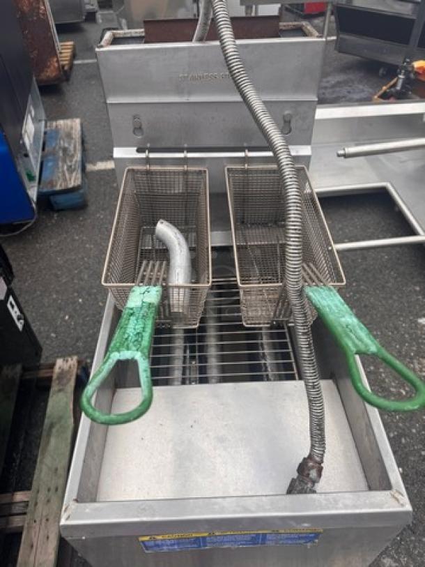 Pitco 35C+S natural gas floor fryer with two baskets, 35 lbs capacity, stainless steel, used condition, visible markings.