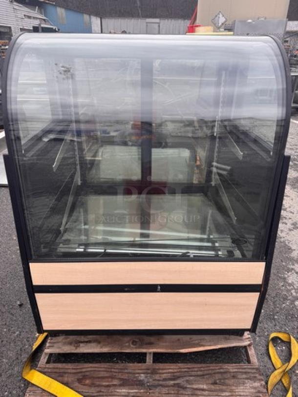 Federal CGR3652 refrigerated display case with curved glass, wood paneling, power connection visible; used condition.