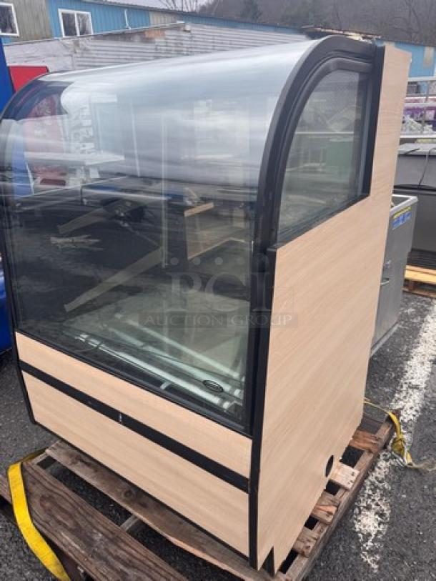 Federal CGR3652 Refrigerated Display Case with curved glass front, wood finish sides, and interior shelving, in good condition.
