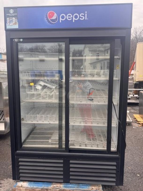 QBD CD45-HC Cooler merchandiser in good condition, featuring glass sliding doors, multiple shelves, and Pepsi branding.