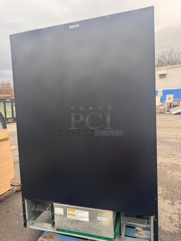 QBD CD45-HC Cooler merchandiser, robust black design, energy-efficient model, visible external unit components and label indicating specifications.