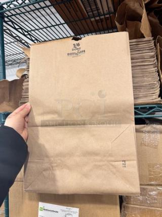 Brown 1/6 paper bag with "DURO" branding and "DUALIFE" marking, shown in-hand on storage shelving.