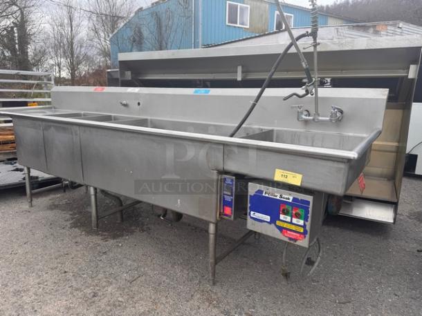 140-inch 4 bay commercial sink, stainless steel, features faucet and sprayer, labeled for section use, pre-owned condition.
