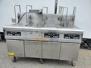 Frymaster FMPH355BLSC NG fryer, stainless steel, multi-basket, well-used condition, branded control panels visible.
