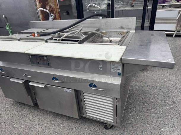 H&K International hot dog steamer stand, stainless steel, multiple compartments, and temperature controls, used condition.