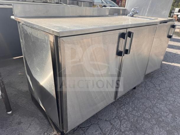 DUKE RUF-48 48" undercounter refrigerator, stainless steel, dual doors, sturdy handles, visible wear, ideal for commercial use.