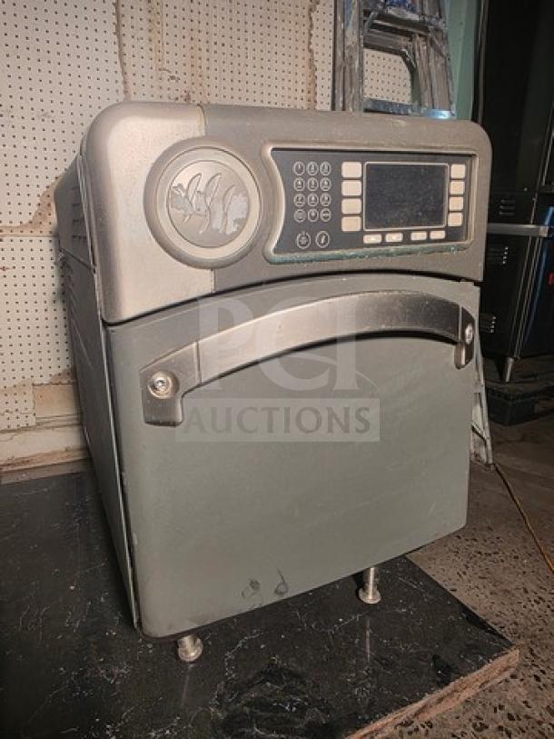 Turbochef NGO high-speed countertop oven, grey finish, digital control panel, model NGO. Used condition with minor wear.