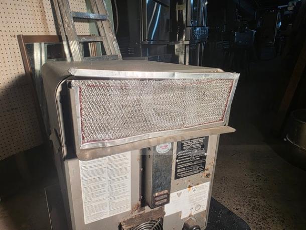 Turbochef NGO high speed accelerated countertop oven with control panel visible. Used condition, stainless steel exterior.