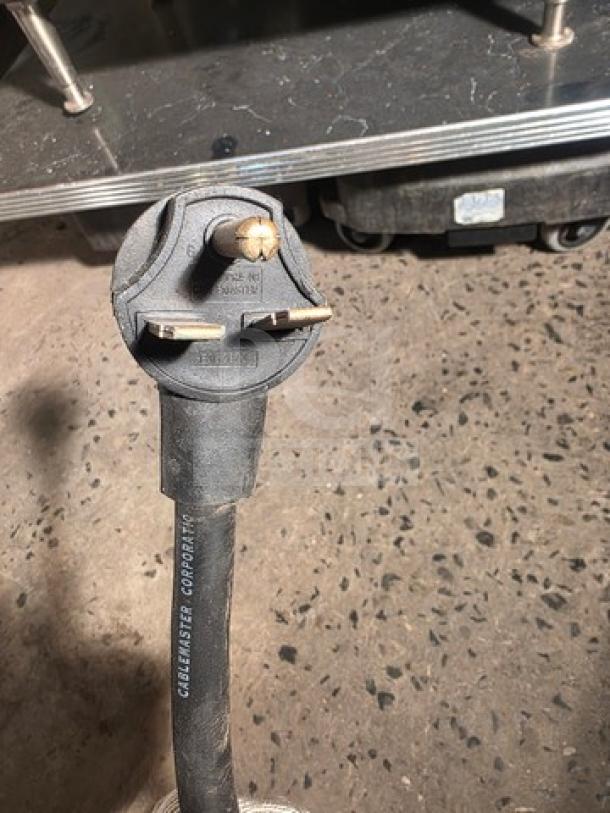 Close-up of a power plug for a TurboChef NGO high-speed accelerated countertop oven.