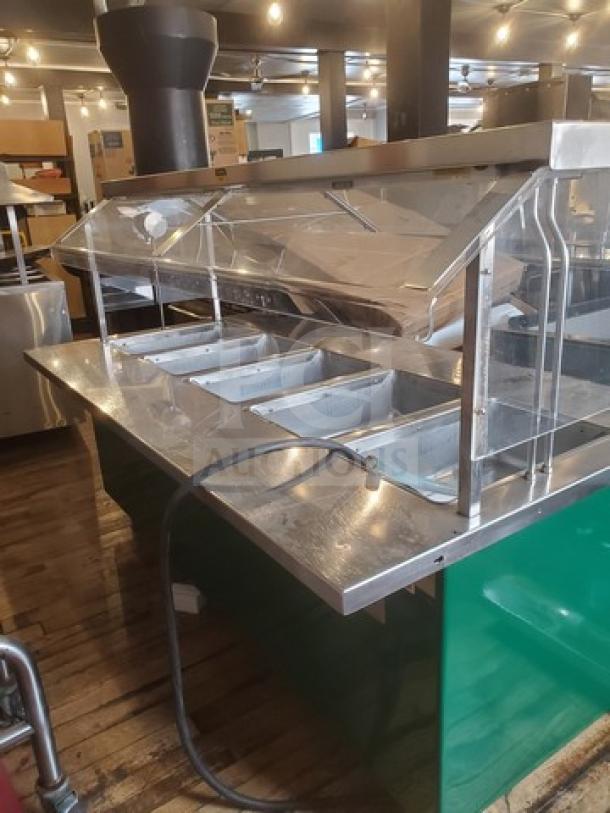 Colorpoint 5 bay steam table 120V in stainless steel. Features clear sneeze guard, five trays. Good condition. Ideal for buffets.