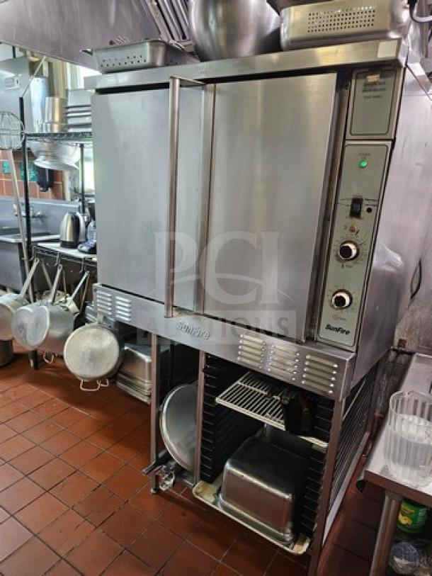 SUNFIRE full-size single deck convection oven, stainless steel, dual doors, control knobs, and vents, in used condition.