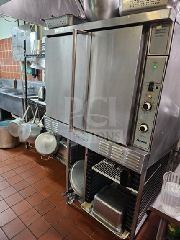 SUNFIRE full-size single deck convection oven in stainless steel; controls on side panel; commercial kitchen setting.
