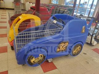 Blue car-shaped shopping cart with number 32 on the side, featuring a child seating area. Visible wear on wheels.