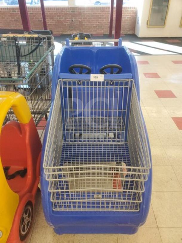 Blue shopping cart with child seat and attached mini steering wheels, metal wire basket, item number 109.