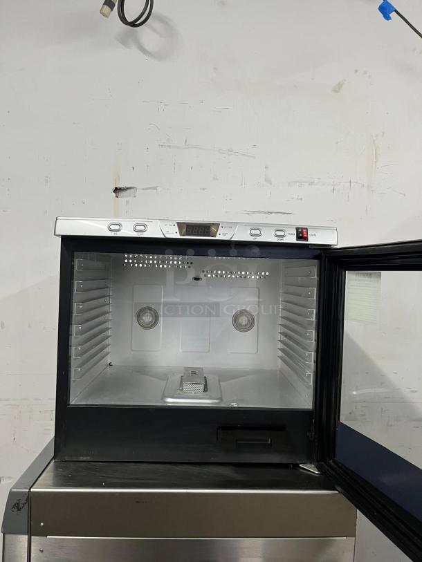 BRAND NEW Weston Pro-1200, 12-tray digital dehydrator, 80L, silver, open door view, pristine condition, digital controls.
