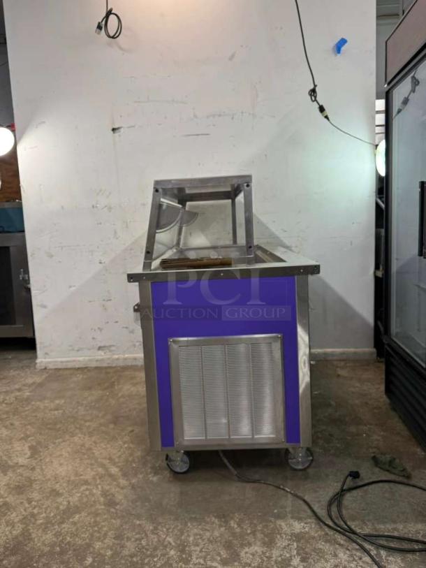Delfield SCSC-60-EFP 60" refrigerated food prep table, stainless steel, caster wheels, power cable visible, good condition.