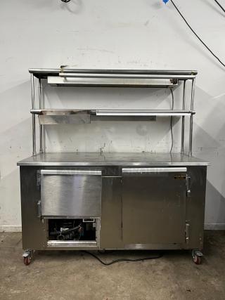 LEADER LB48 under-counter refrigerator with 2 full and 1 half doors, double shelves, and heat lamp; visible wear, labeled CoolTech.