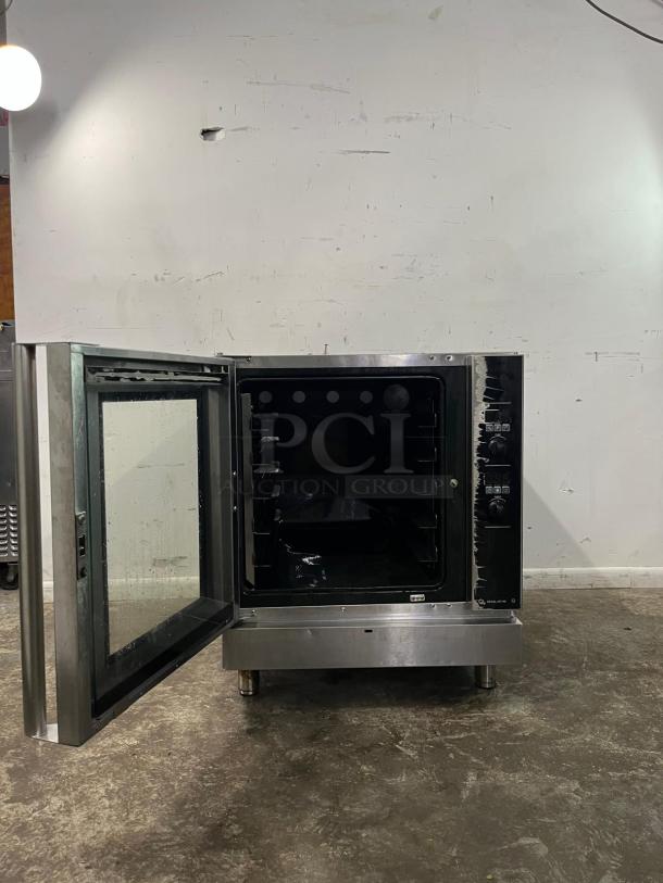 MOFFAT TURBOFAN gas convection oven, 33,000 BTU, single-deck, stainless steel, commercial-grade, door open, visible racks.