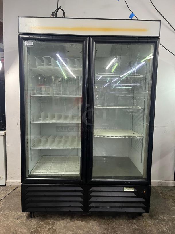 EDESA eDMO-49 double door commercial merchandiser, glass doors, adjustable shelves, used condition.