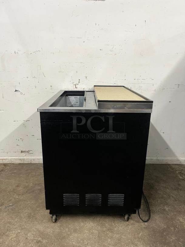 True T-36-GC-HC 36 3/4" black glass froster, plate chiller; sturdy build, used condition; model label visible inside.