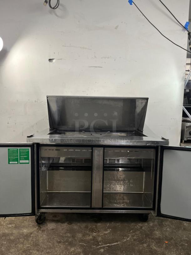 Turbo Air MST-48-18-N 48in Sandwich Salad Prep Cooler, stainless steel, open doors, space for 18 pans, good condition.