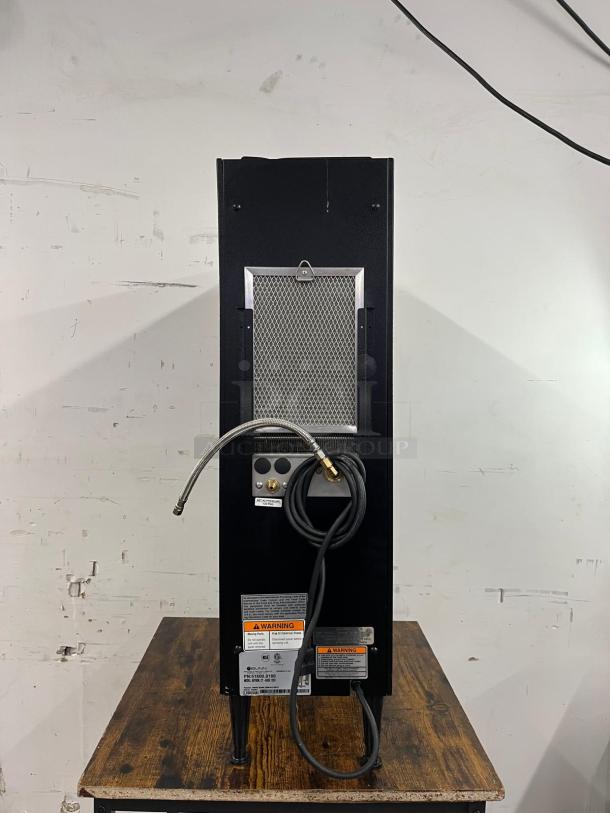 Bunn Nitron CT-Base cold brew coffee dispenser, model 51600.0106, 2-gallon capacity, countertop unit with visible warning labels.