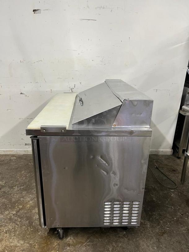 Turbo Air MST-48 sandwich/salad prep table, stainless steel, good condition, features casters and refrigerated storage.