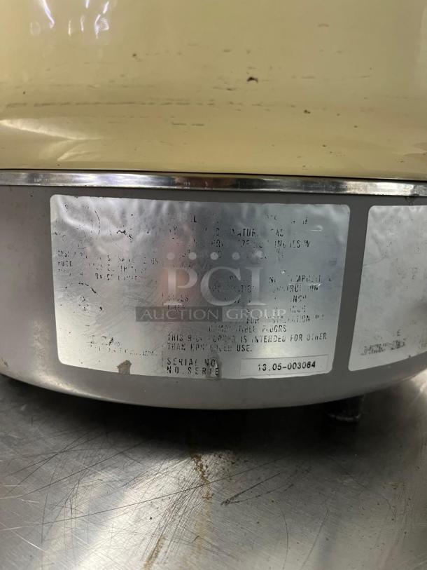 Rinnai RER55ASN 55 cup commercial natural gas rice cooker, metal label shows specifications and serial number 13.05-003064.