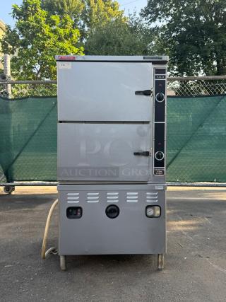 Market Forge ST-24M36G convection steamer, 24-pan, 300,000 BTU, freestanding model with 36" boiler, ST-24 Series.