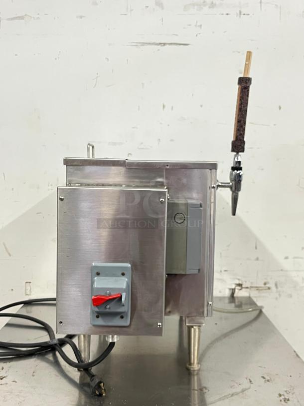 KEGRATOR commercial beer dispenser, portable countertop keg cooler, stainless steel, with tap handle and electrical switch.