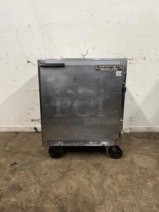 Beverage-Air 27" undercounter refrigerator, stainless steel, on casters, with visible brand logo and moderate wear.