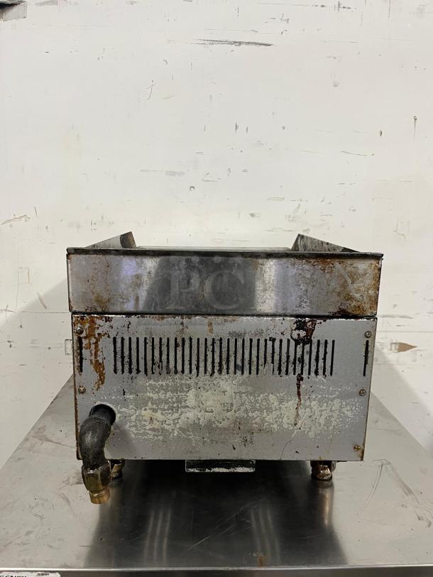 Star-Max 15in radiant gas charbroiler, countertop model. Notable rust and wear, visible vent slits and gas connector.