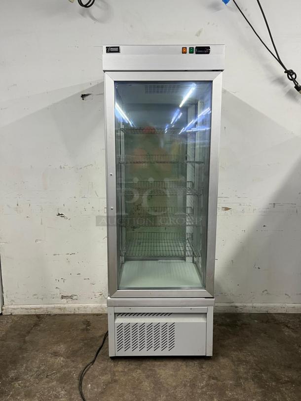 TEKNA 4400 NFP glass refrigerated display case, 4-sided, shelving, stainless steel finish, used condition.