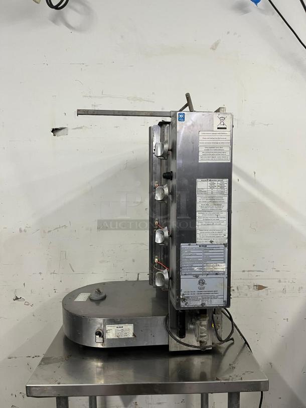 INOKSAN PDG400N doner kebab machine, natural gas, field convertible, mesh shield, 132-165 lb. capacity, controls visible.