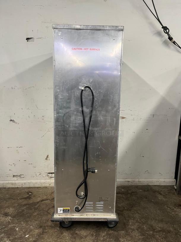 Avantco HEAT-1836 full-size insulated heated holding cabinet, clear door, 120V, shows rear with caution label and power cord.