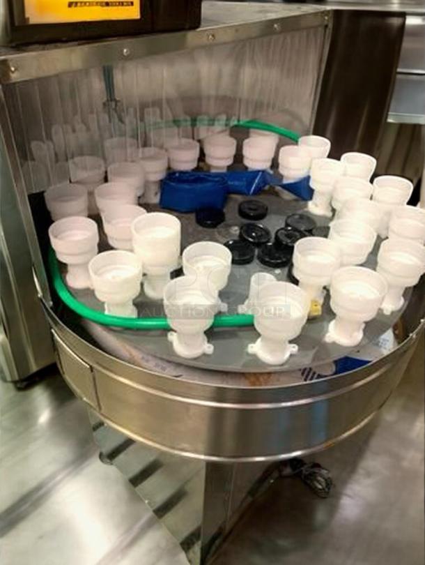 Tang Rotary Round Bottle Washer, superb condition, automatic inner/outer rinse, fully tested, model TNG-L-WASH-0420.