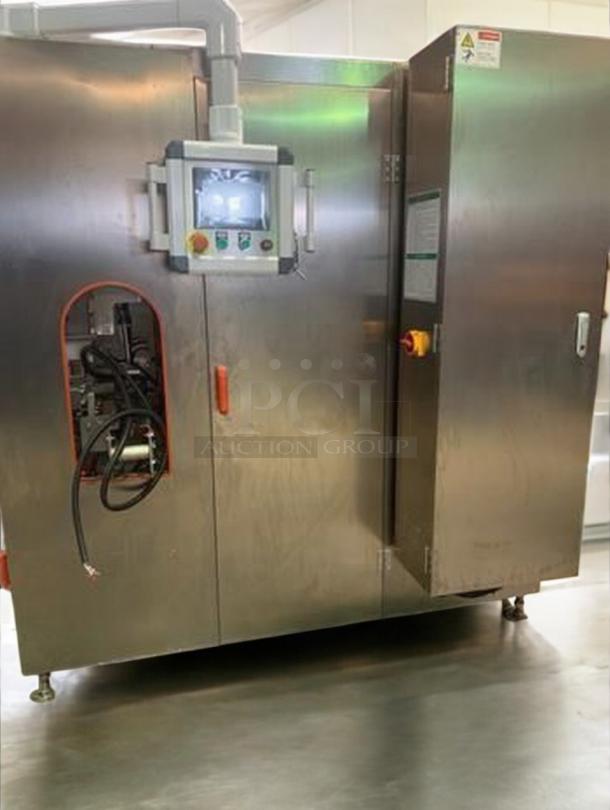 Premium condition TANG two-head automatic filling machine for sauces and liquids. Features control panel, fully tested. Model: TAN-L-FIL-0423.