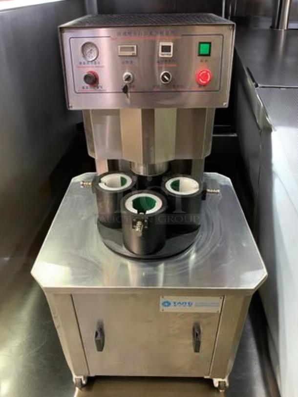 Tang Machinery Four-Station Semi-Automatic Vacuum Capper, premium condition, part of complete production line, fully operational.