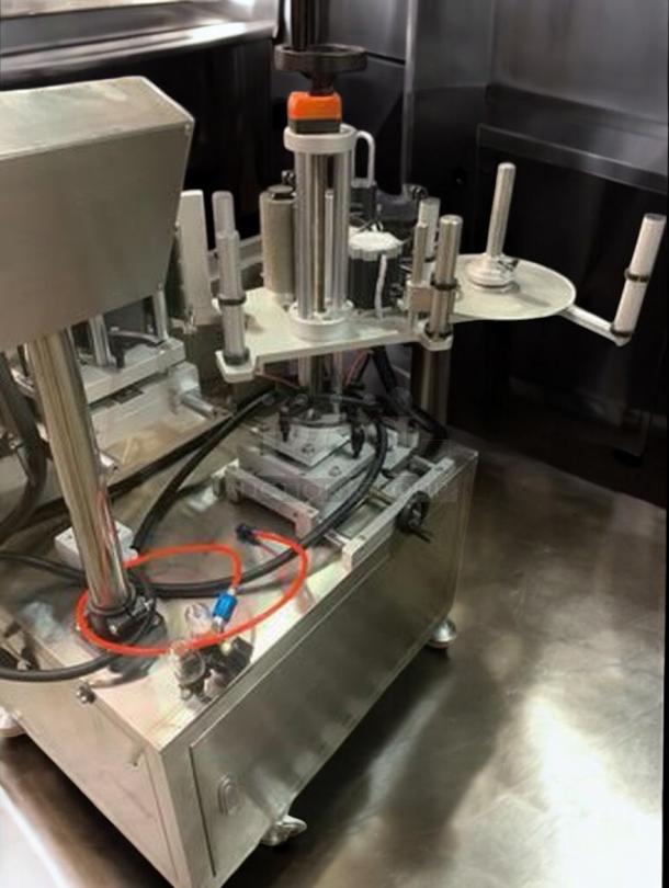 Premium Tang round bottle labeling machine, model TGM-TY01. High-speed, 360° wrap, fully tested, excellent condition.