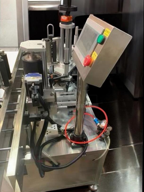 Premium Tang round bottle labeling machine, model TGM-TY01, 360° wrap-around, operational, tested, high-speed.